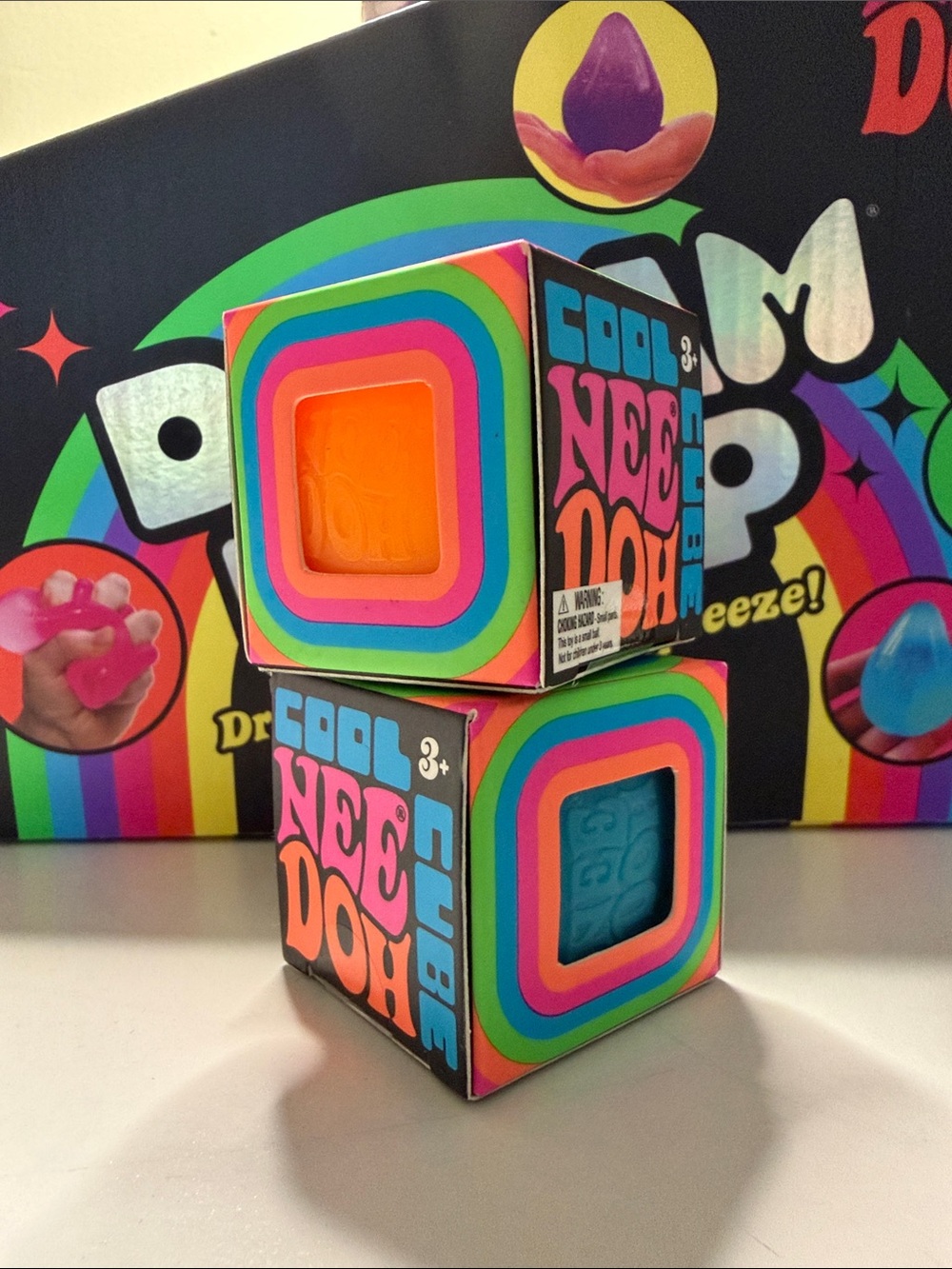 Poshmark Title
NeeDoh Cool Cubes Squishy Fidget Toy Orange and Blue NEW in Box